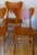 Set of 4 finely made 'butterfly' dining chairs, two-toned in teak and beech, with unusually shaped 'butterfly' backs and...