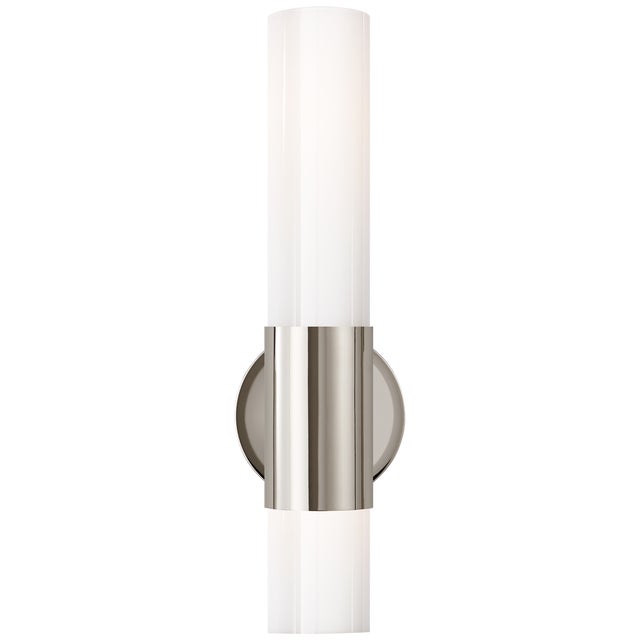 Penz Medium Cylindrical Sconce in Polished Nickel with White Glass Designer: AERIN Height: 15" Extension: 4.5" Backplate:...