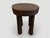 Antique African side table or stool hand carved from a single block of wood. This side table or stool was sourced in the...