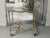 This elegant golden bar cart from 1881, exudes retro charm and timeless sophistication, perfect for elevating your...
