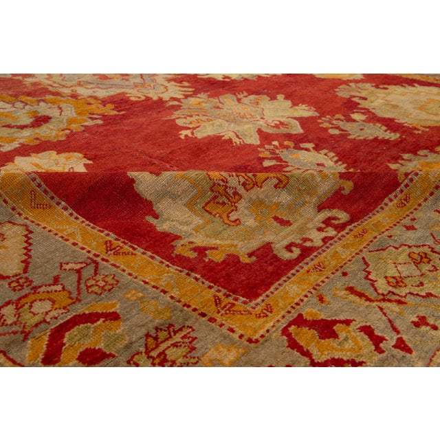 Turkish Oushak Antique Wool Rug Handmade in Red Featuring a Floral Design For Sale - Image 10 of 11