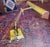 Brass library lamp with adjustable shade and arm. Imperfections include a dent on top of shade (as photographed) and...