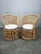 Exceptional pair of Italian bamboo and rattan lounge chairs dating from the 1960s. These highly decorative chairs feature...