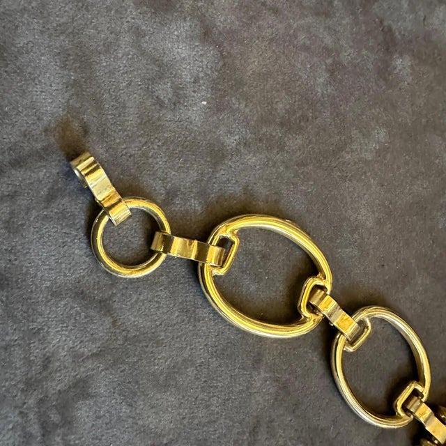 This bold 1990s vintage Italian statement bracelet captures the iconic Neo-Classical revival aesthetic made famous by...