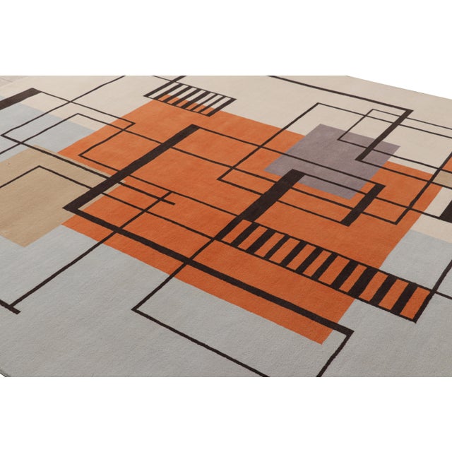 Hand-knotted in wool, this 8x10 rug by Rug & Kilim features geometric patterns in the style of a Leleu or Da Bruhns...