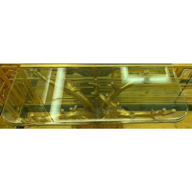 1980s vintage glass top console table with gold resin tree branch base set on top of rectangular wood pediment with hand...
