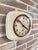 Elegant vintage wall clock by diehl (made in germany), featuring a square case with rounded corners, crafted from ivory-...