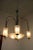 This chandelier was designed in the 1950s. It is made from burnished brass and Murano glass with air bubbles inside. The...