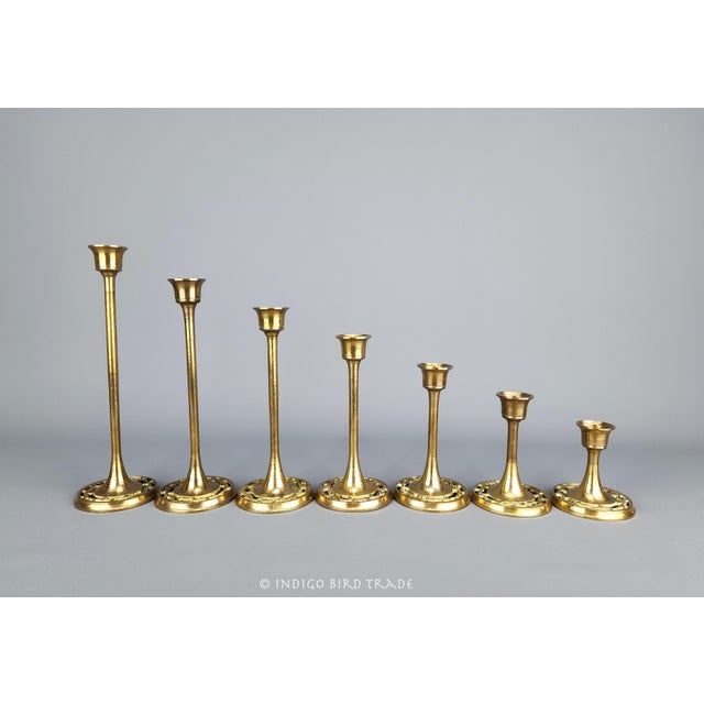 Set of 7 Vintage Brass Candle Holders Tulip Style These beautiful candle holders are made from solid brass and feature...