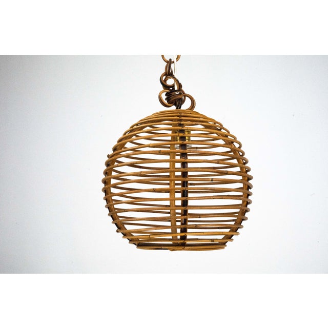 Original bamboo sphere chandelier made in Italy in the 1950s. This elegant mid-century piece features a handcrafted...