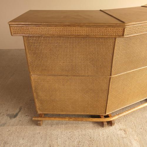 Large bamboo and rattan bar sourced in England dating from 1970s in typical bo-ho style. Extremely practical, this piece...