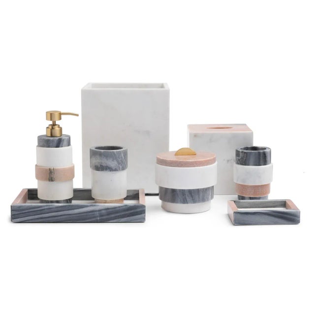 Striking marble accessories for the modern bathroom. The Tripoli collection features three colors of natural marble—rose,...