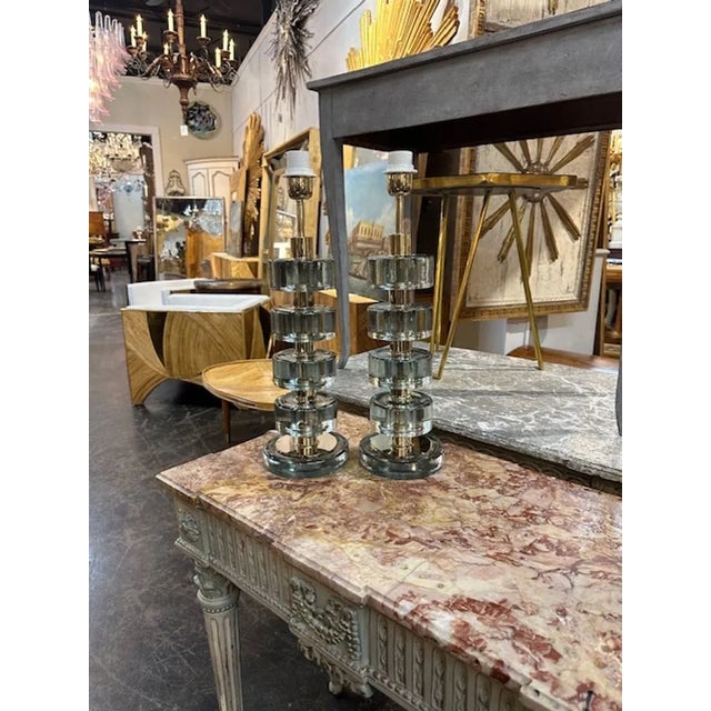 Pair of modern Murano glass and brass disc lamps in Fontana Green. Circa 2000. Perfect for today's transitional designs!