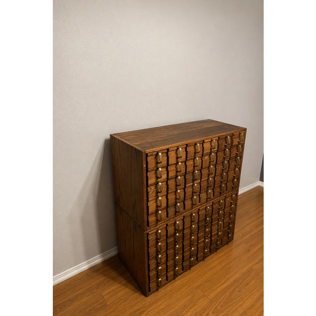 Authentic Jens Risom Design, Inc. card catalog consisting of two matching stackable 30-drawer units (60 drawers total)....