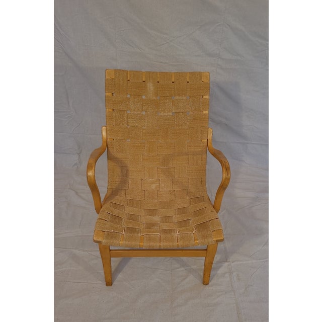 These are a beautiful pair of wonderful mid-century chairs made in Sweden, by Bruno Mathsson. They have a natural fiber...