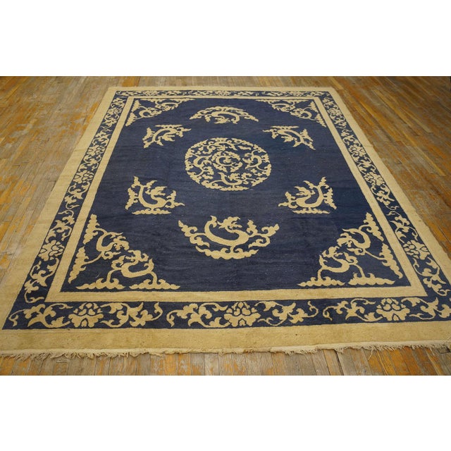 Antique Chinese Peking Medallion Blue 1900s Rug, Circa Date: 1900s. This exceptional piece exemplifies the refined...
