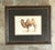 This vintage framed camel print offers a refined interpretation of natural history illustration, featuring delicate line...