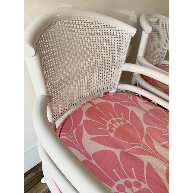 Vintage White Bamboo Swivel Chairs With Floral Pink Seat Cushions a