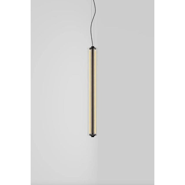 Jordi veciana b15 t v transparent glass suspension lamp for parachilna suspension lamp made of an aluminum structure...