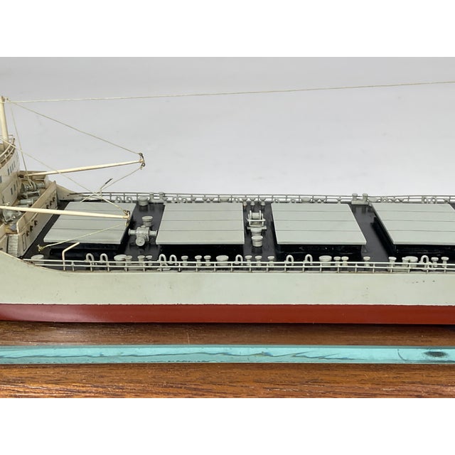 This waterline model of a Japanese ore/oil carrier is attributed to the builder, K. Akao from Osaka, Japan. Presented on a...