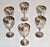 Set of 6 Sherry Goblets silver-plated with a polished finish and a decorative stem design, which is consistent with...