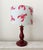 Vintage ceramic lamp base in a blood-red color, with a custom-made cylindrical lampshade upholstered in light blue striped...