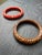 Bakelite 1980s Pair of Vintage Molded Plastic Bakelite Style Bangle Bracelets – Coral and Brown Floral Relief For Sale - Image 4 of 6
