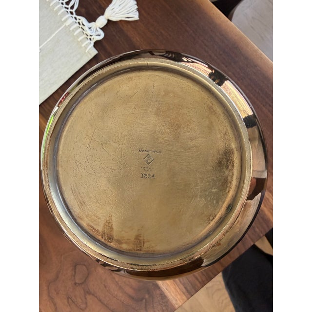 It is believed that the underside marking identifies this piece as an antique silver-plated hollowware item made by the...