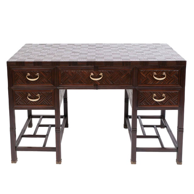 Gorgeous stained bamboo and hardwood campaign desk with five drawers. Finely detailed parquet work on top, sides and back...