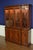 This is a Traditional Georgian Style Breakfront China Cabinet/Bookcase by Leighton Hall. It features four bottom doors and...
