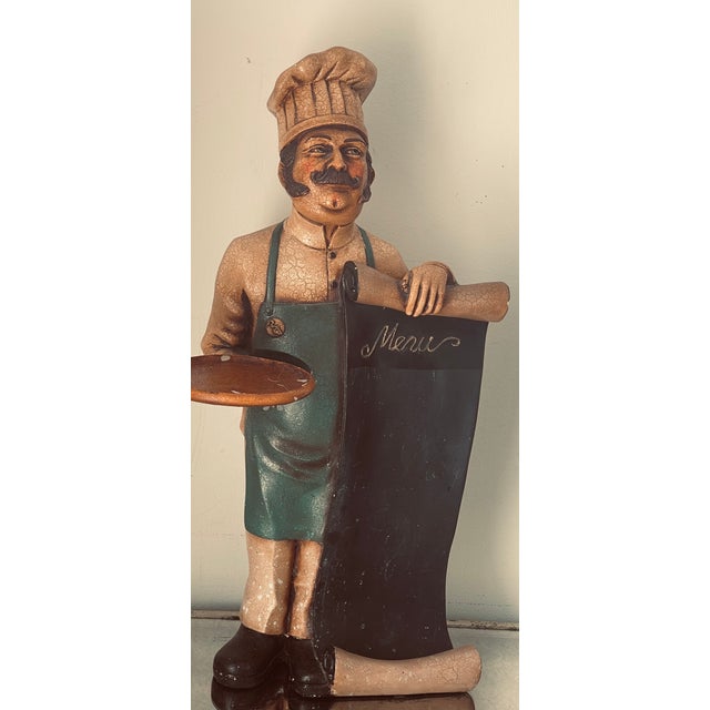 Great vintage restaurant advertising menu sign as French cook figure.