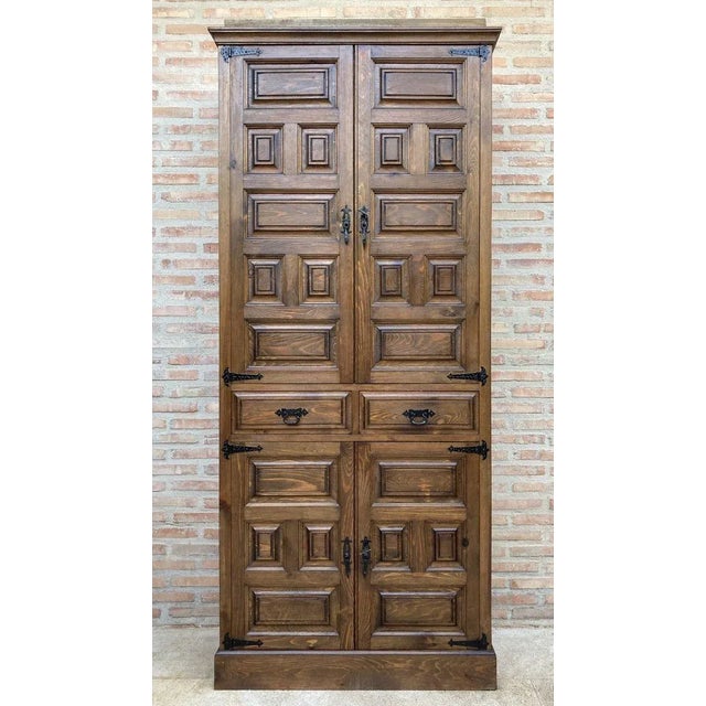 19th Century Walnut Cupboard or Cabinet. Catalan style wardrobe, with panels, in very good condition. It has inside 4...