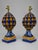 A visually commanding pair of sculptural table lamps, each modeled as an exuberant artichoke raised upon an architectonic...
