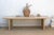 A monumental centerpiece commanding space with honest timber history and a clean, architectural silhouette. This large...