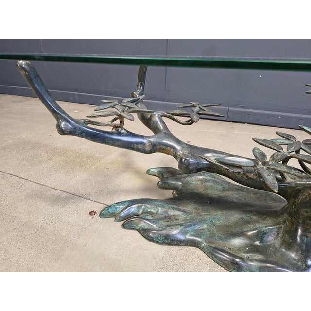 Metal bonsai coffee table by Willy Daro. Beautifully manufactured sculpture, comes with a clear glass top. Bronzed metal...