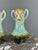 An elegant pair of glazed ceramic vases in the Art Nouveau style, dating from the late 19th to early 20th century. These...