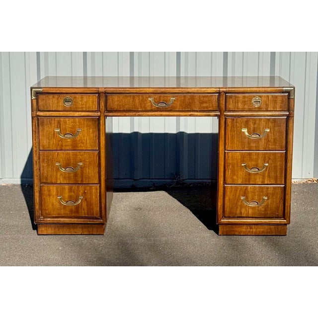 Vintage 1980's campaign style partner desk from Drexel Heritage's "Accolade II" collection. Warm walnut veneers with...