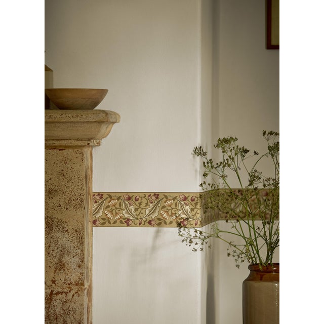 Celebrating the beauty of the original document which had a typical Morris visual narrative this horizontal border...