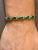 This exceptionally affordable Tennis bracelet has 18 stones of Pear shape Emeralds . Each Emerald is spaced by a two...