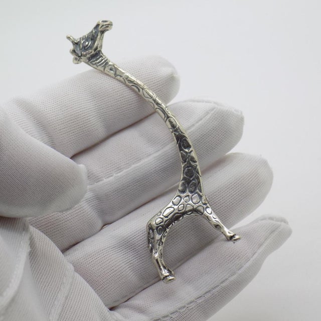 Vintage miniature sculpture with an essential, highly elegant design, depicting a stylised giraffe, handcrafted in italy...