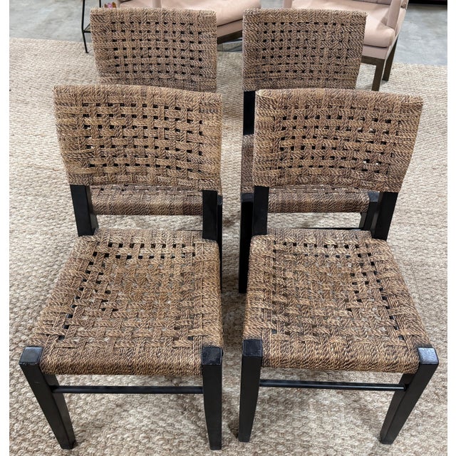 Set of Four Palecek Blackened Pananawood and Woven Seagrass Dining Chairs, Late 20th Century A stylish set of four dining...