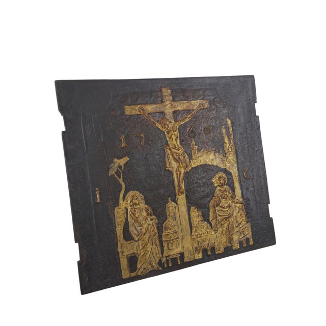 A sacred Baroque stove plate (Ofenplatte), Germany, dated 1760. Cast iron, in relief. Christ is shown crucified at the...