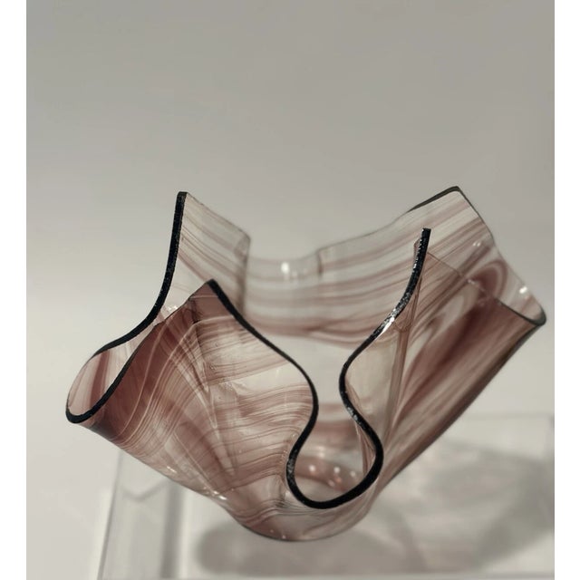 Elegant ribbon art glass handkerchief bowl featuring flowing swirls of rich purple glass. Designed in the classic...