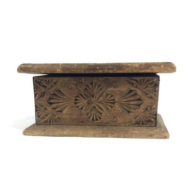 A beautiful and very old box that was probably used for jewelry or money for the head of the family. This box has been...