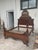 Mid-19th century Victorian Eastlake walnut carved Lincoln style bed. Features a high back with burled panels, carved...