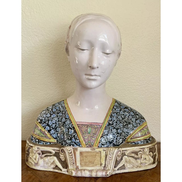 A spectacular large majolica bust by Angelo Minghetti after Francesco Laurana’s marble model, 19th century Italian. The...