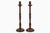 Antique pair of tall mahogany candlesticks, the column having a baluster turning at the base that rises to five ring...