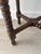 An elegant little antique side table in dark-stained wood, with authentic charm and a refined silhouette. Its round top...