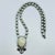 Ben-Amun (Signed) c. 1980s Runway Era long silver tone beaded pendant necklace featuring sculptural silver tone beads and...
