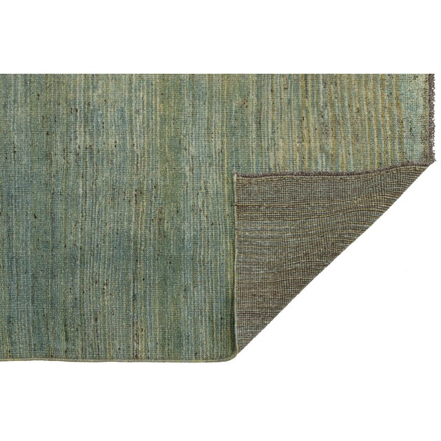 Transform your space with this authentic hand-knotted Gabbeh rug, made from 100% premium hand-spun wool. Featuring a...